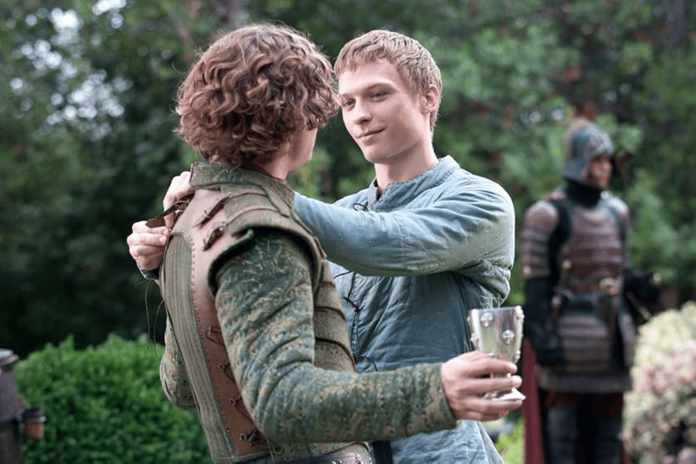 Oliver adjusts Ser Loras Tyrell's armor