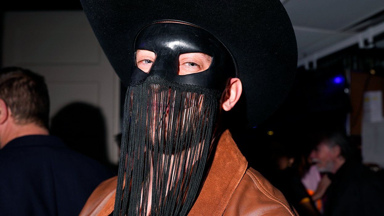Orville Peck black cowboy hat fringe mask