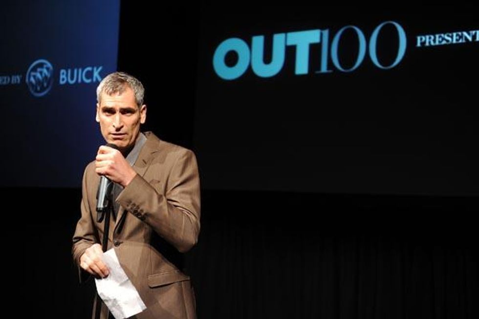 Out's Editor in Chief Aaron Hicklin speaks to the crowds at the Out100 party