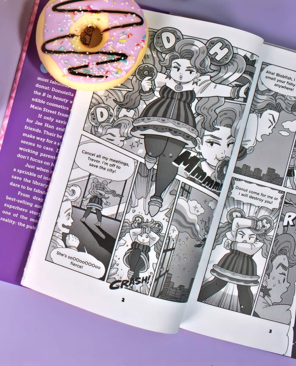 Pages of Donutella Hamachi and the Library Avengers photographed at an event