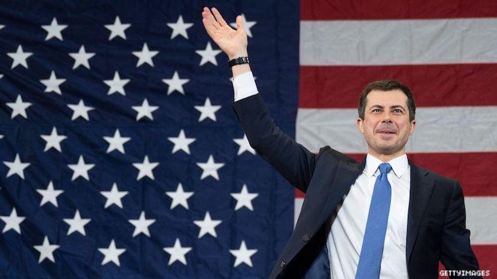 Pete Buttigieg in front of American flag
