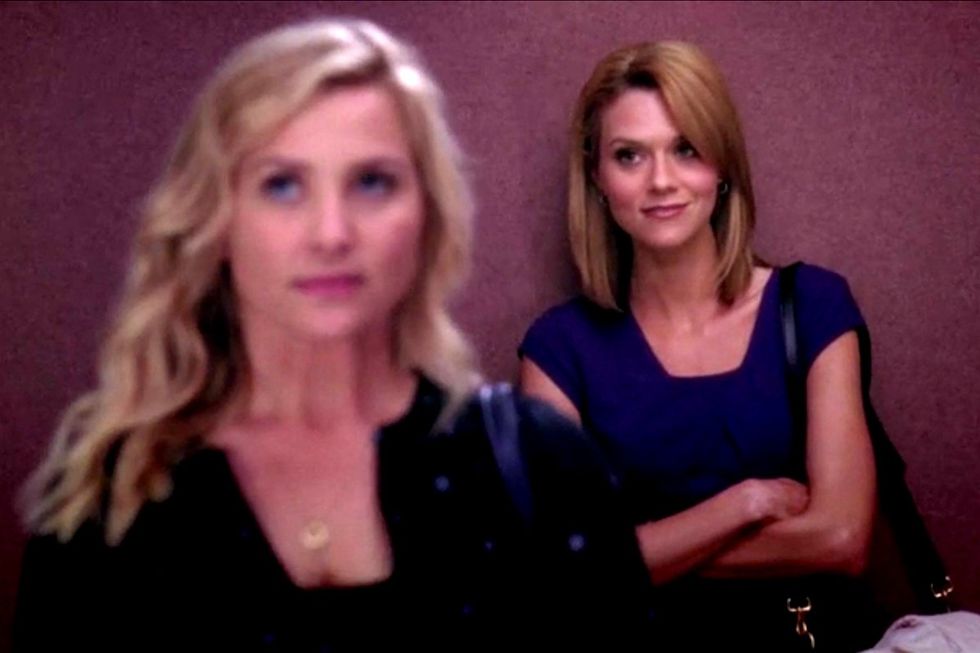 photo gallery listicle Greys Anatomy LGBTQ Doctors Arizona Robbins in soft focus left foreground with Dr Lauren Boswell in sharp focus on the right