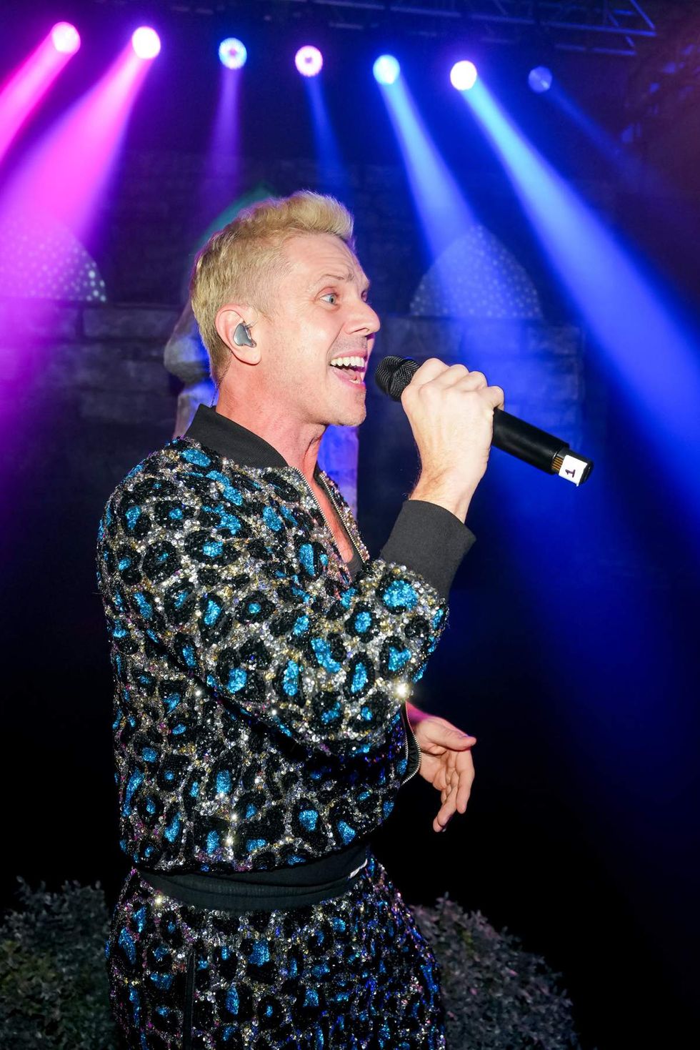 Photo gallery of the 2025 Grindr Pleasure Ball in NYC with theme Garden of Otherworldly Delights