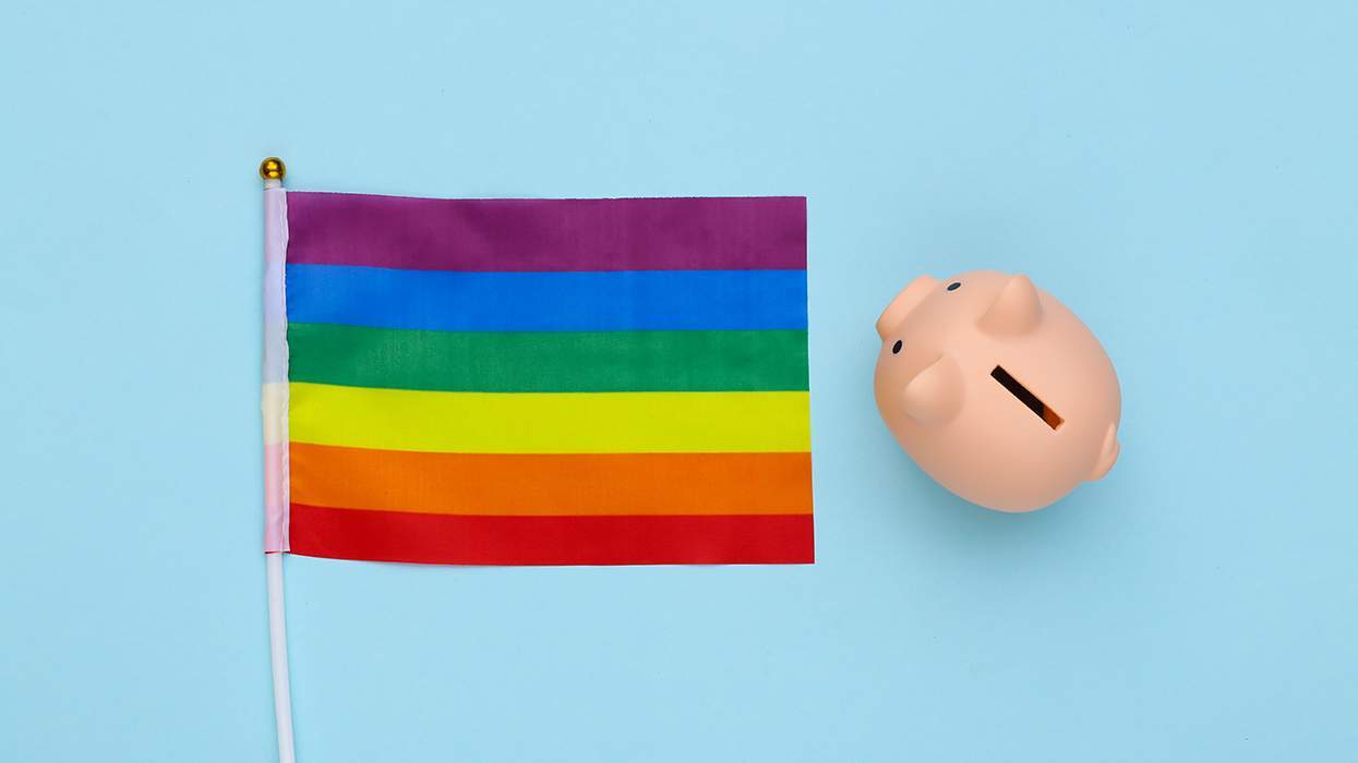 Piggy bank and LGBTQ rainbow flag