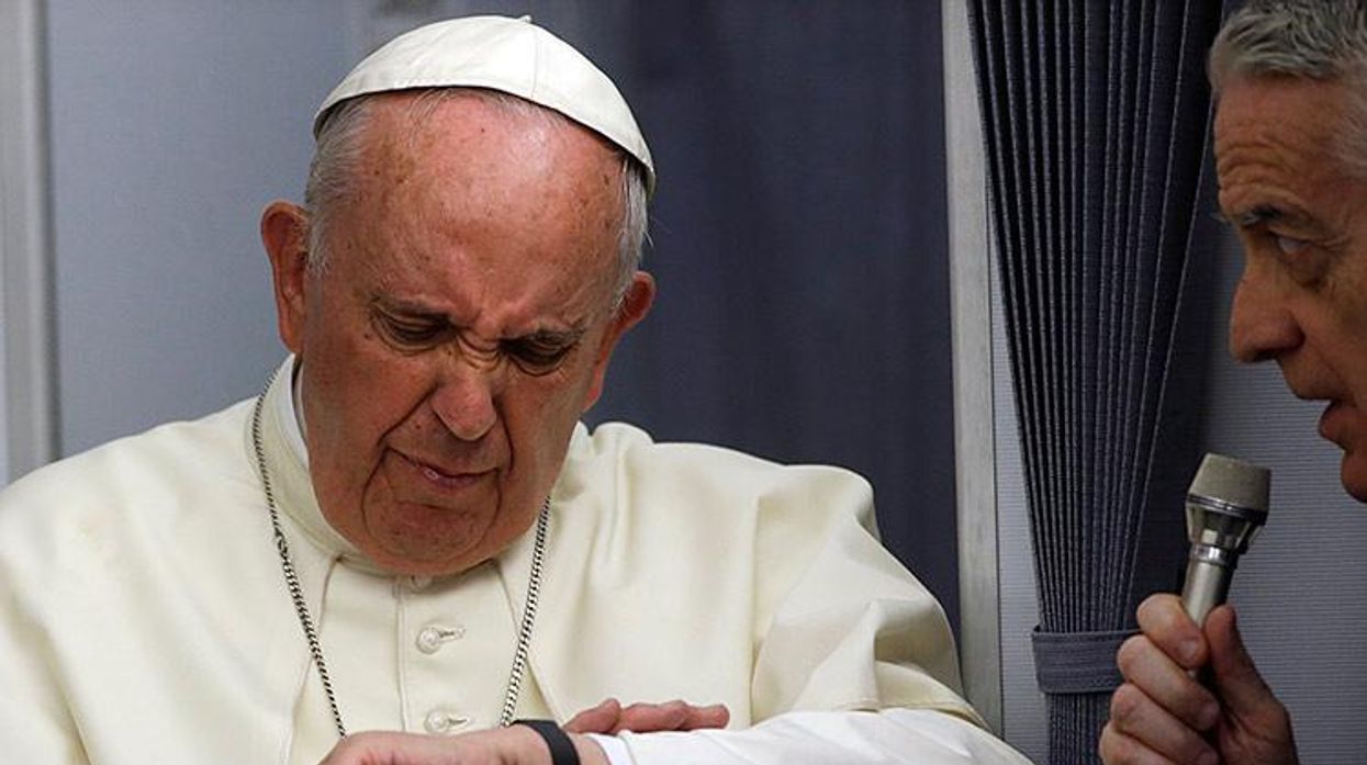 Pope Francis and Vatican spokesman Federico Lombardi