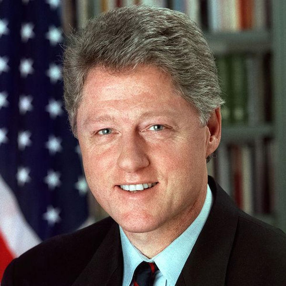 President Bill Clinton signs Defense of Marriage Act into law
