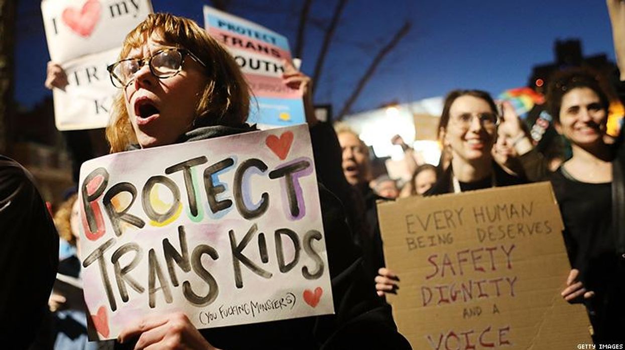 "Protect trans kids" protest sign