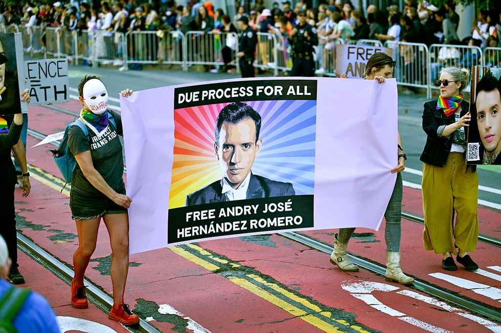 Protestors carry a sign in support of Andry Jose Hernandez Romero during the 2025 LGBTQIA Pride Parade San Francisco California June 2025