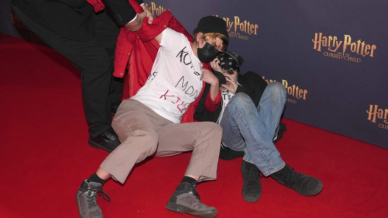 Protestors on the red carpet.