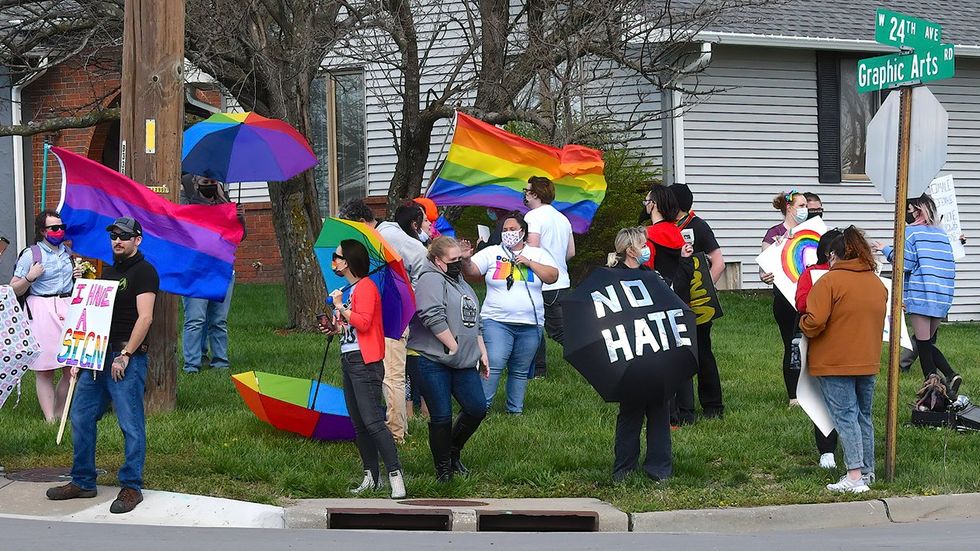 rainbow umbrella shields in front of the Emporia Middle School (Kansas 2021)