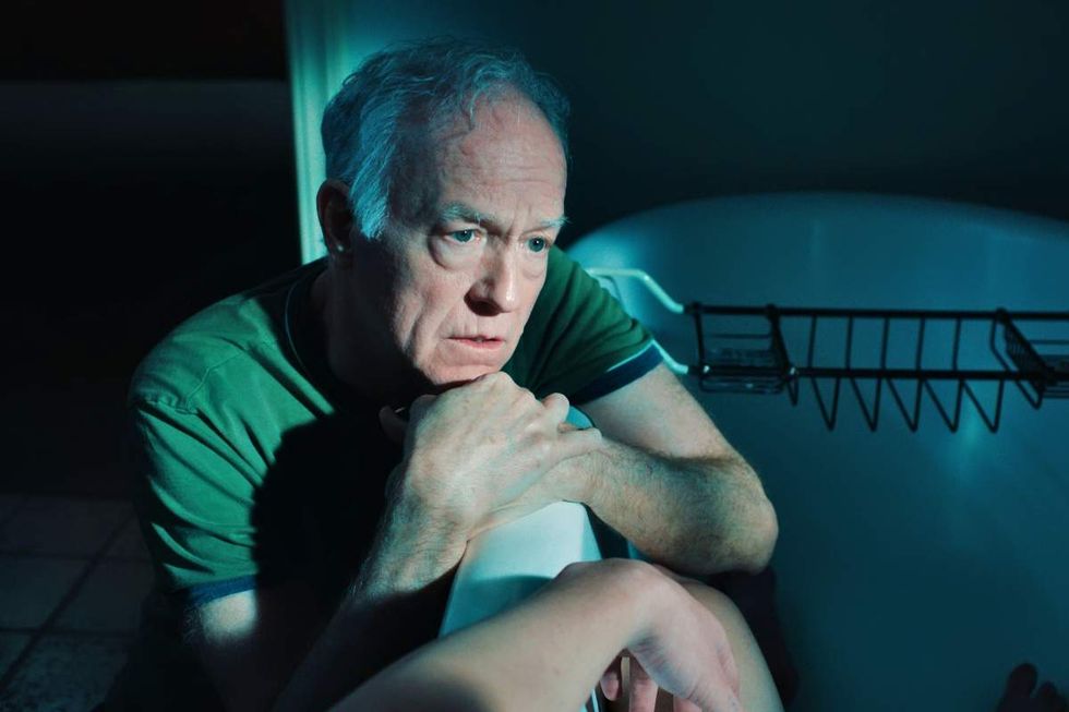 Reed Birney as Hank Grant in Blue Film