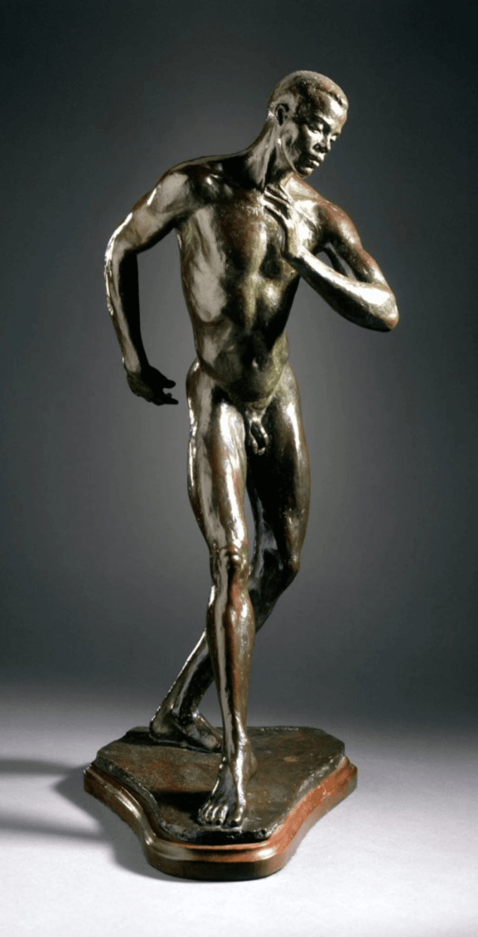 Richmond Barth\u00e9\u2019s Inner Music, a bronze sculpture of a nude male figure posed in graceful movement with one hand held to his chest.