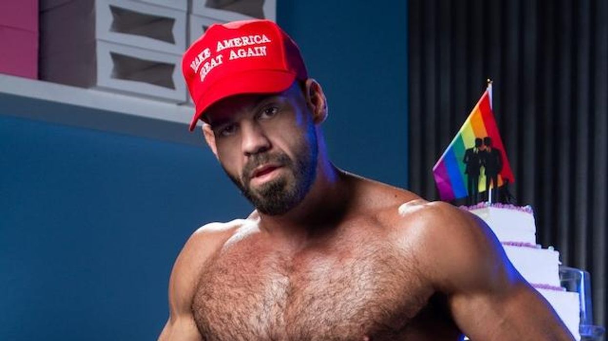 Ricky Larkin wearing a MAGA hat.