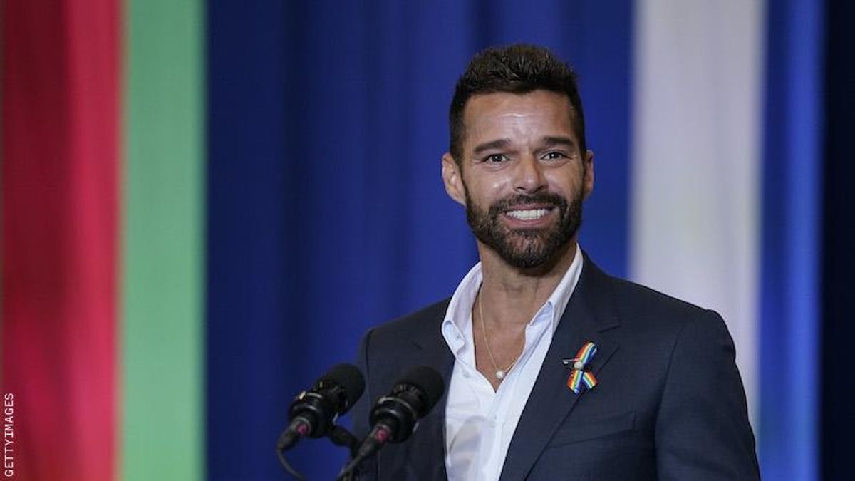 Ricky Martin speaking at a rally.