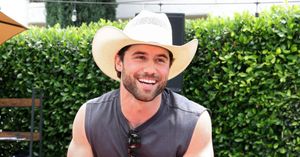 Robbie G.K. shows off his rock-hard abs in alluring new magazine spread