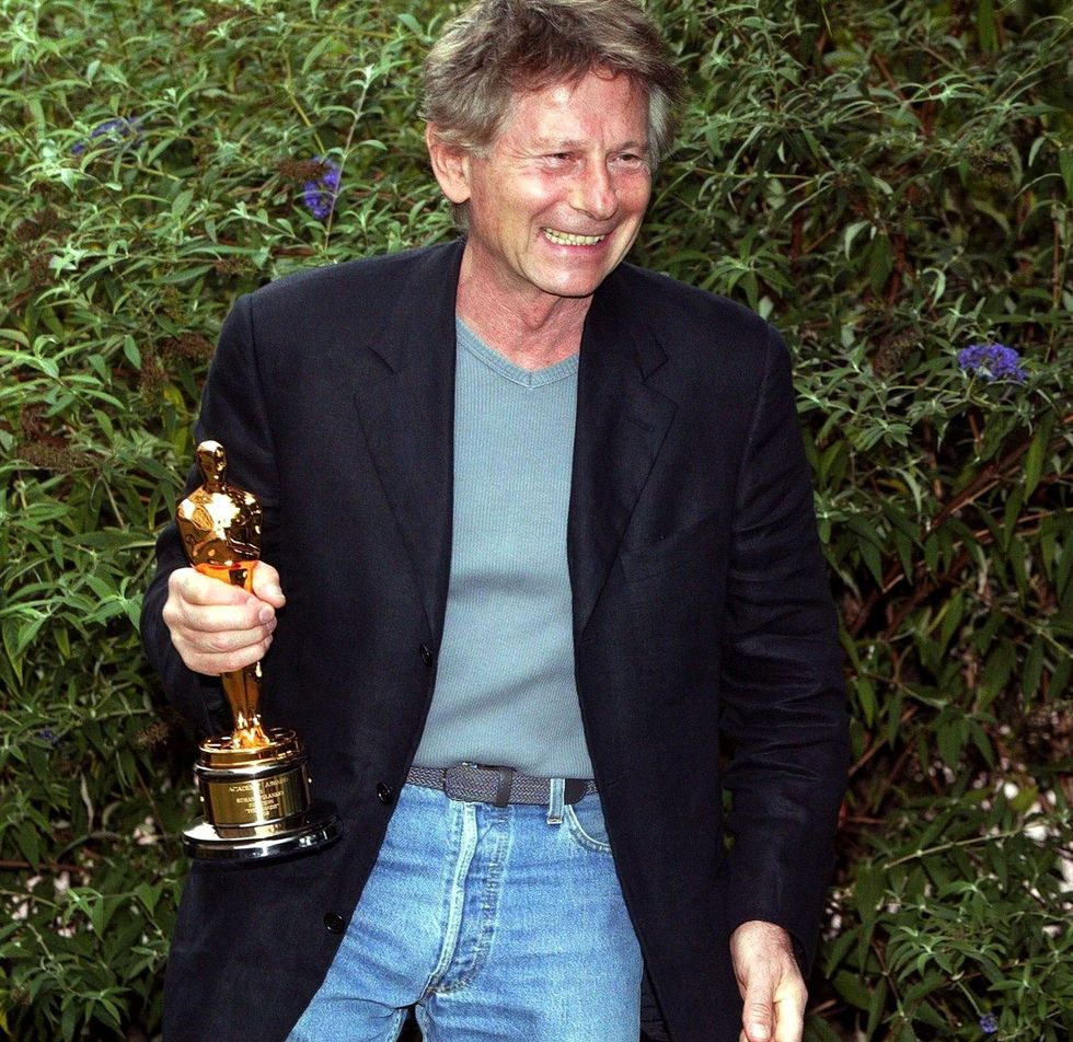 Roman Polanski holding his Academy Award trophy for Best Director