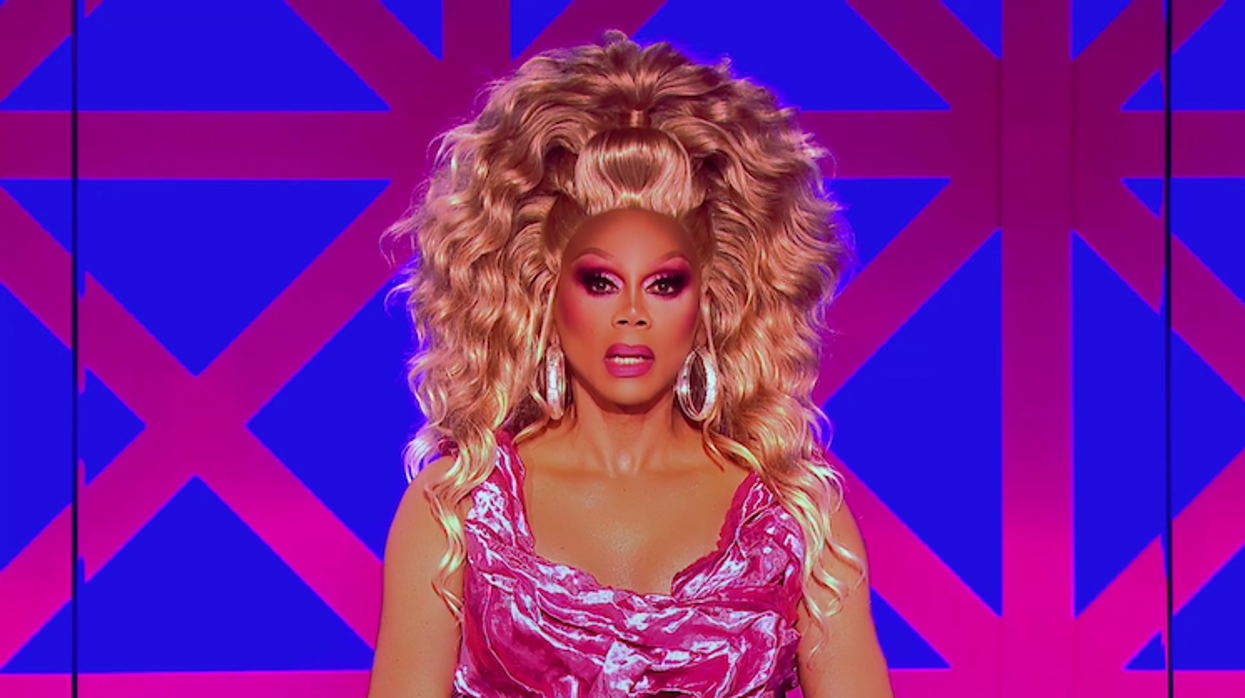 RuPaul on Drag Race UK judging table.