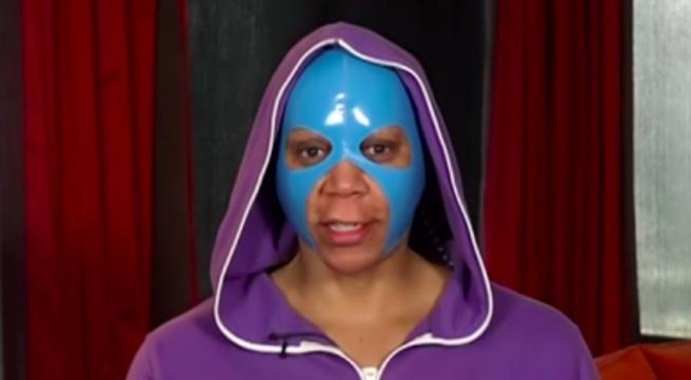 RuPaul wearing a facekini