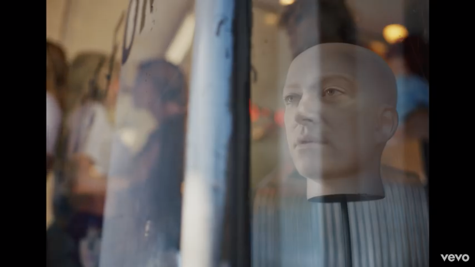 Sam Smith as a mannequin head