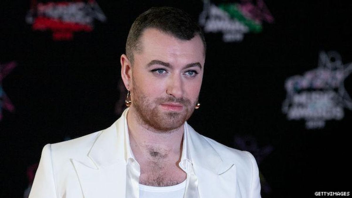 Sam Smith on a red carpet. 