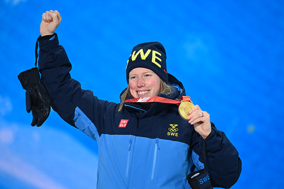 Sandra Naslund takes home the gold medal for Sweden in the Women's Ski Cross event