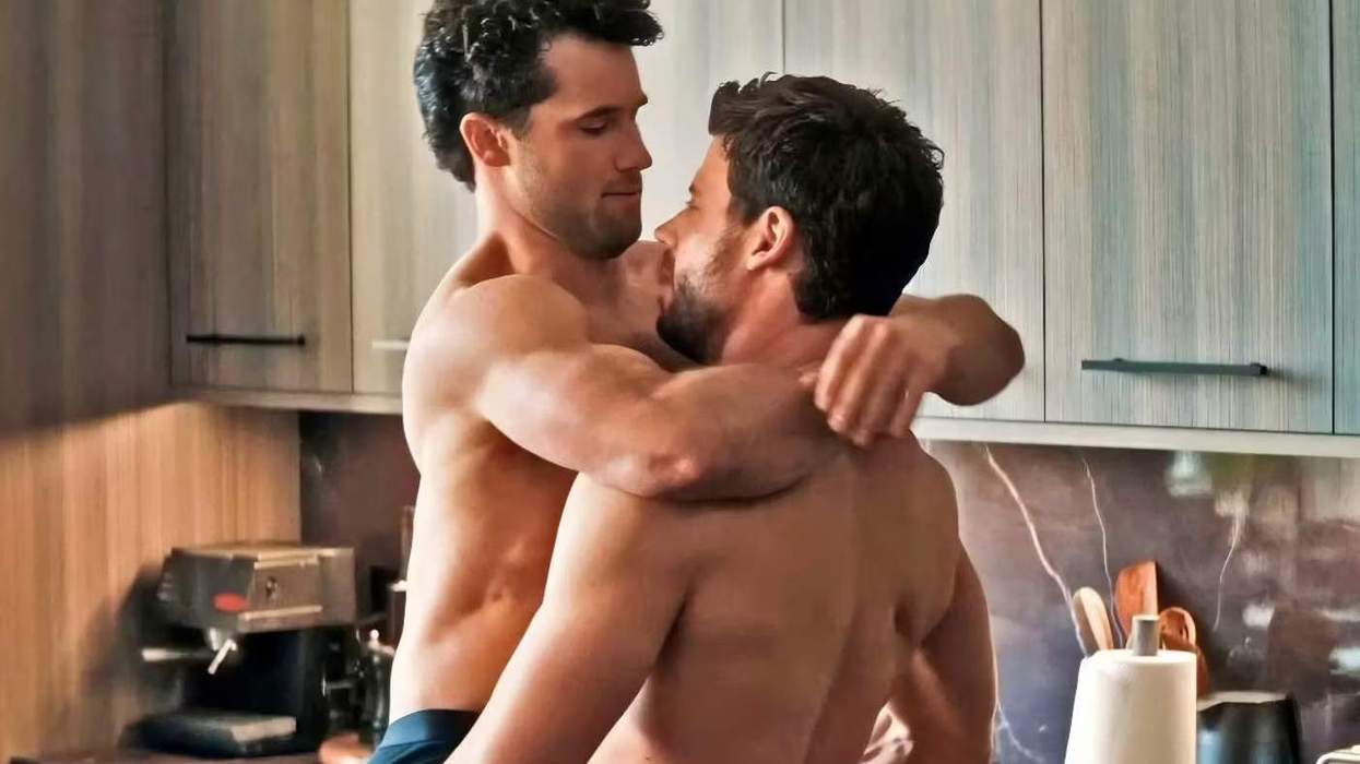 Scott holding Kip in Heated Rivalry