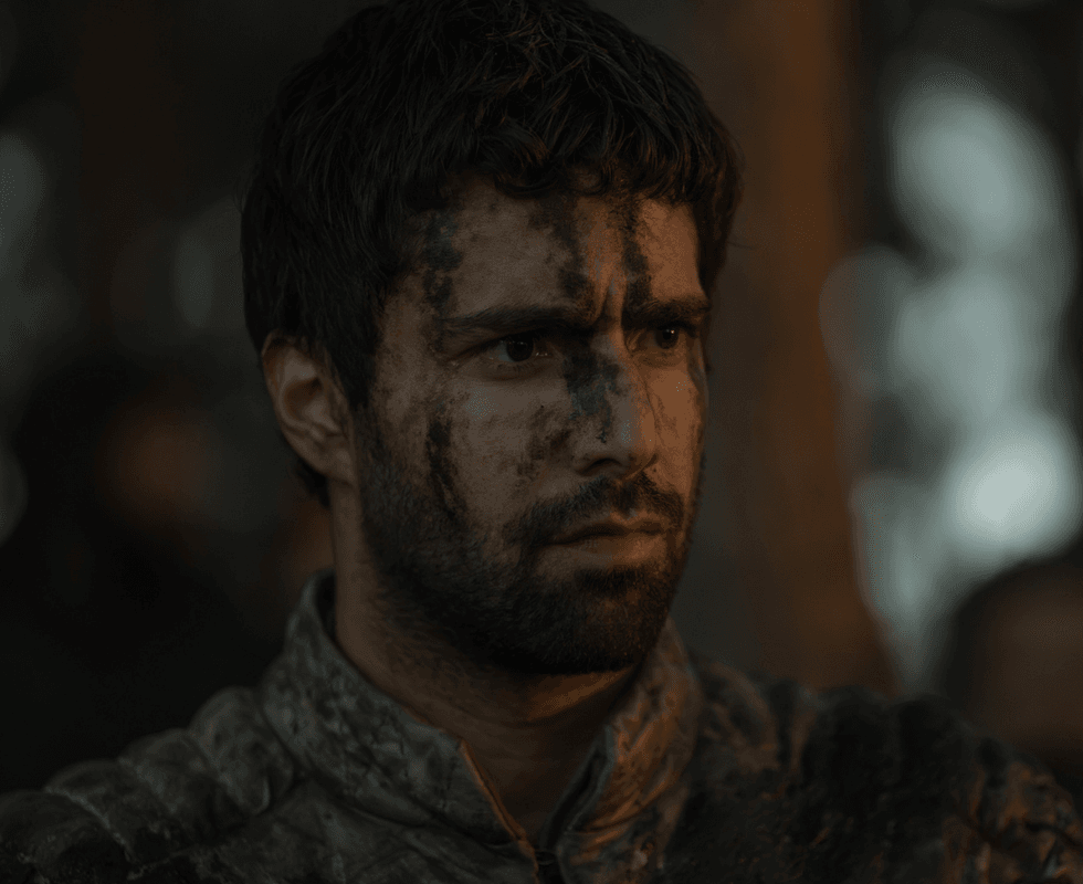 Ser Criston Cole covered in dirt and blood