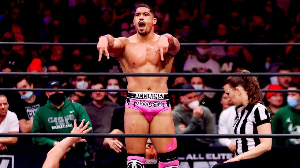 sexy pink bottoms professional wrestler Anthony Bowens battles Jon Moxley during AEW Dynamite Beach Break 2022