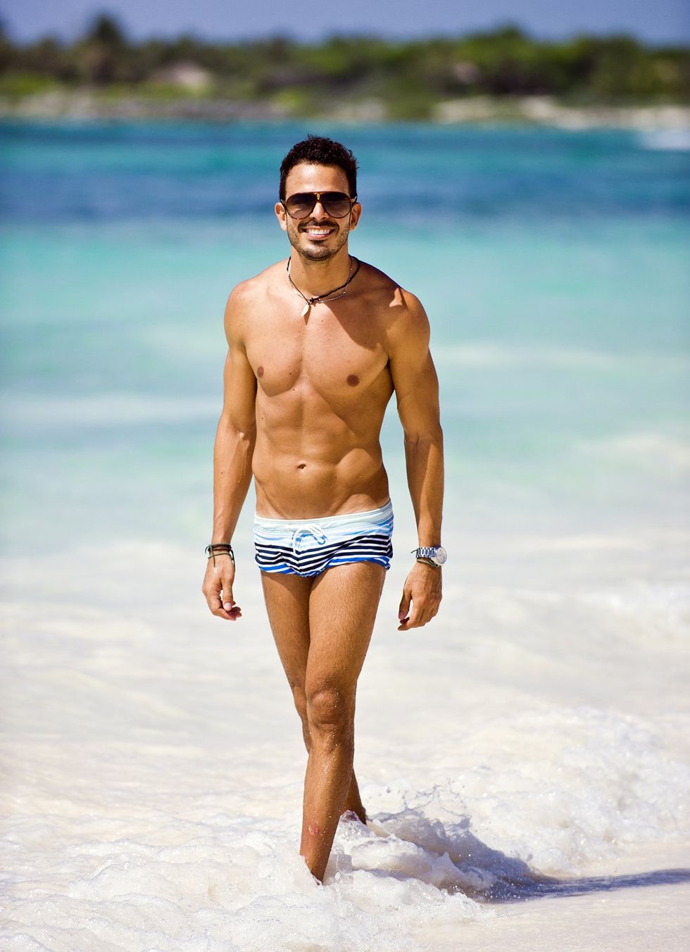 sexy shirtless man on the beach