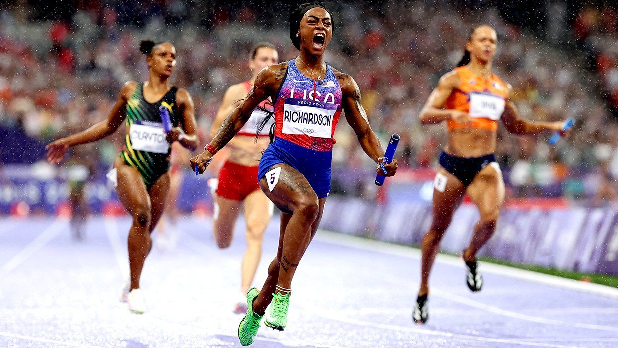 Shacarri Richardson Team United States crosses race finish line win gold medal Olympic Games Paris 2024