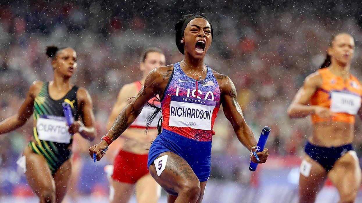 Shacarri Richardson Team United States crosses race finish line win gold medal Olympic Games Paris 2024