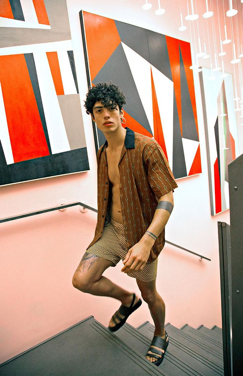 Shirt by Asos, $40; Swim shorts by Frescobol Carioca available at Mr. Porter, $250; Sandals by Hermès, $790
