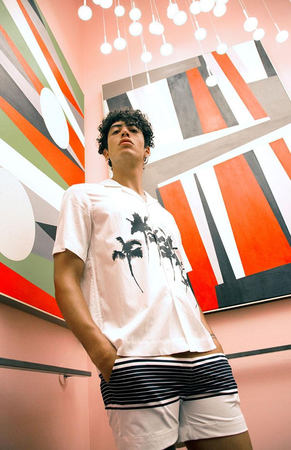 Shirt by Everest Isles, $285; Swim shorts by Vilebrequin, $250.