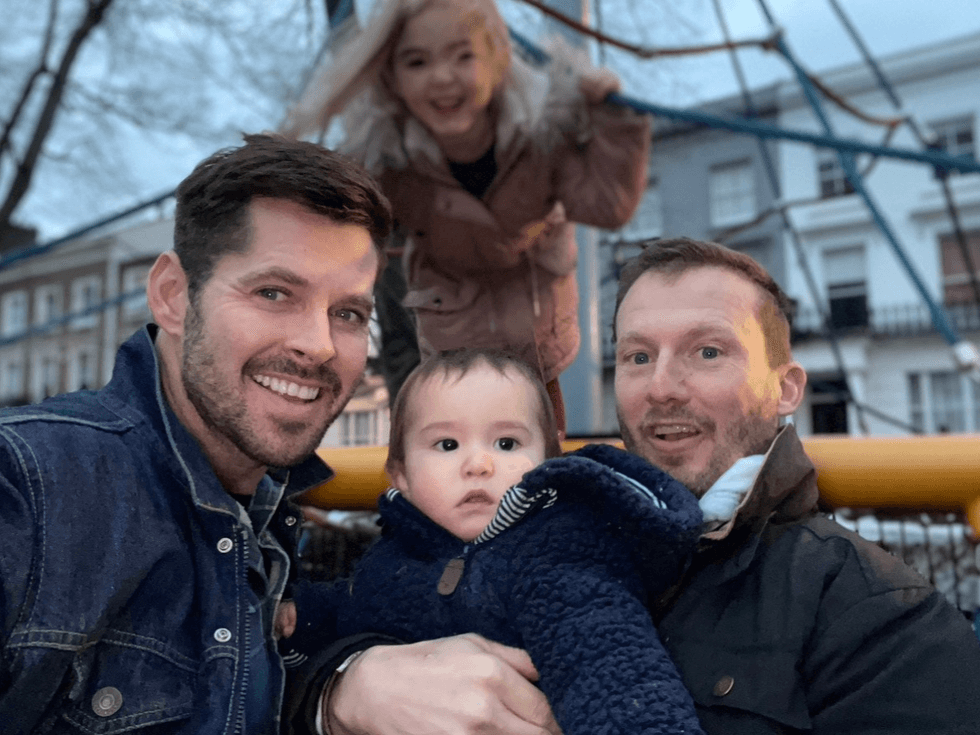 Stephen and his husband with a niece and nephew