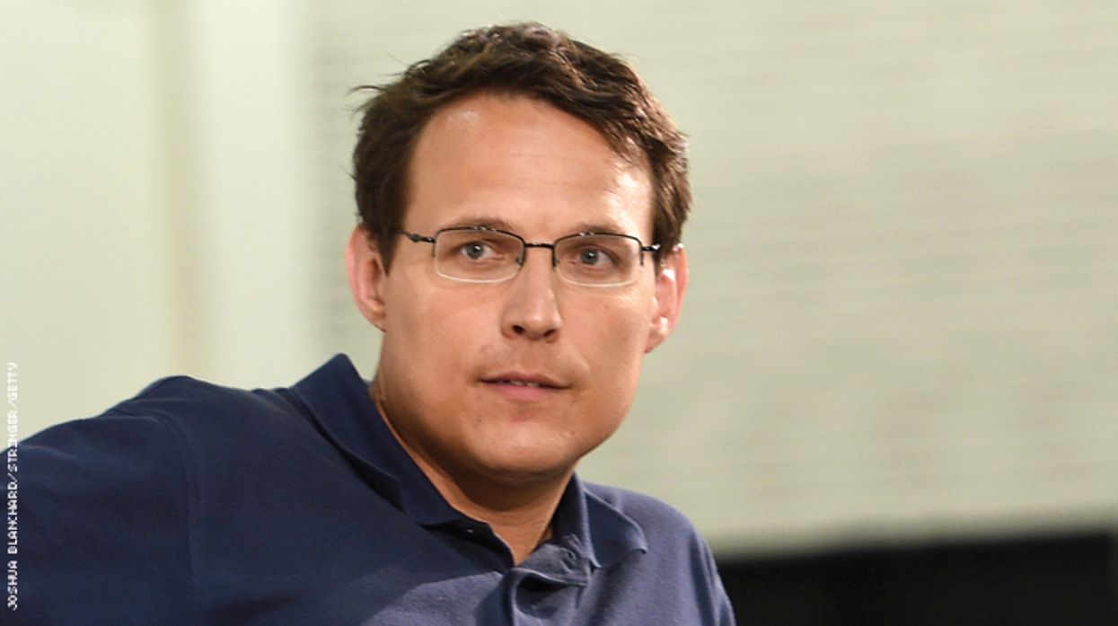 Steve Kornacki on a couch.