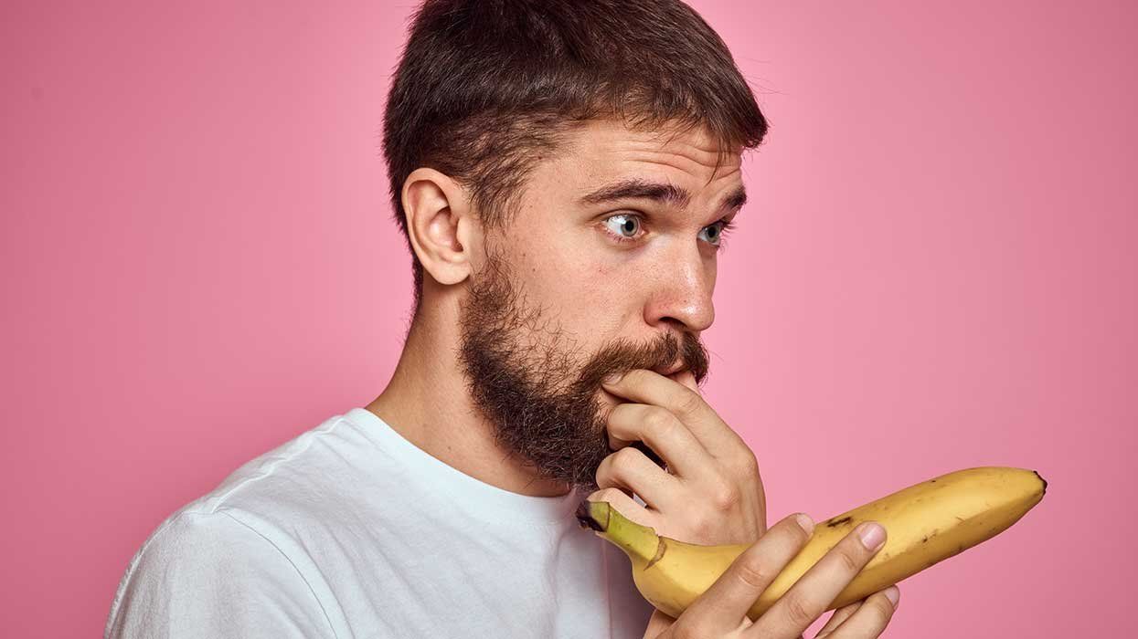 Straight man anxious pegging banana