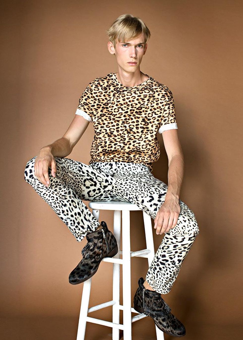 T-shirt by H&M, $29.99; Jeans by G-Star RAW, $180; Boots by John Varvatos, $898