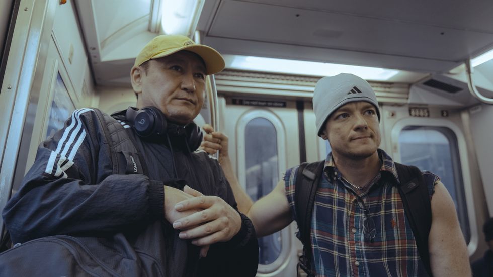 Talap Mamyrkanov and Nolan Hanson ride the NYC subway