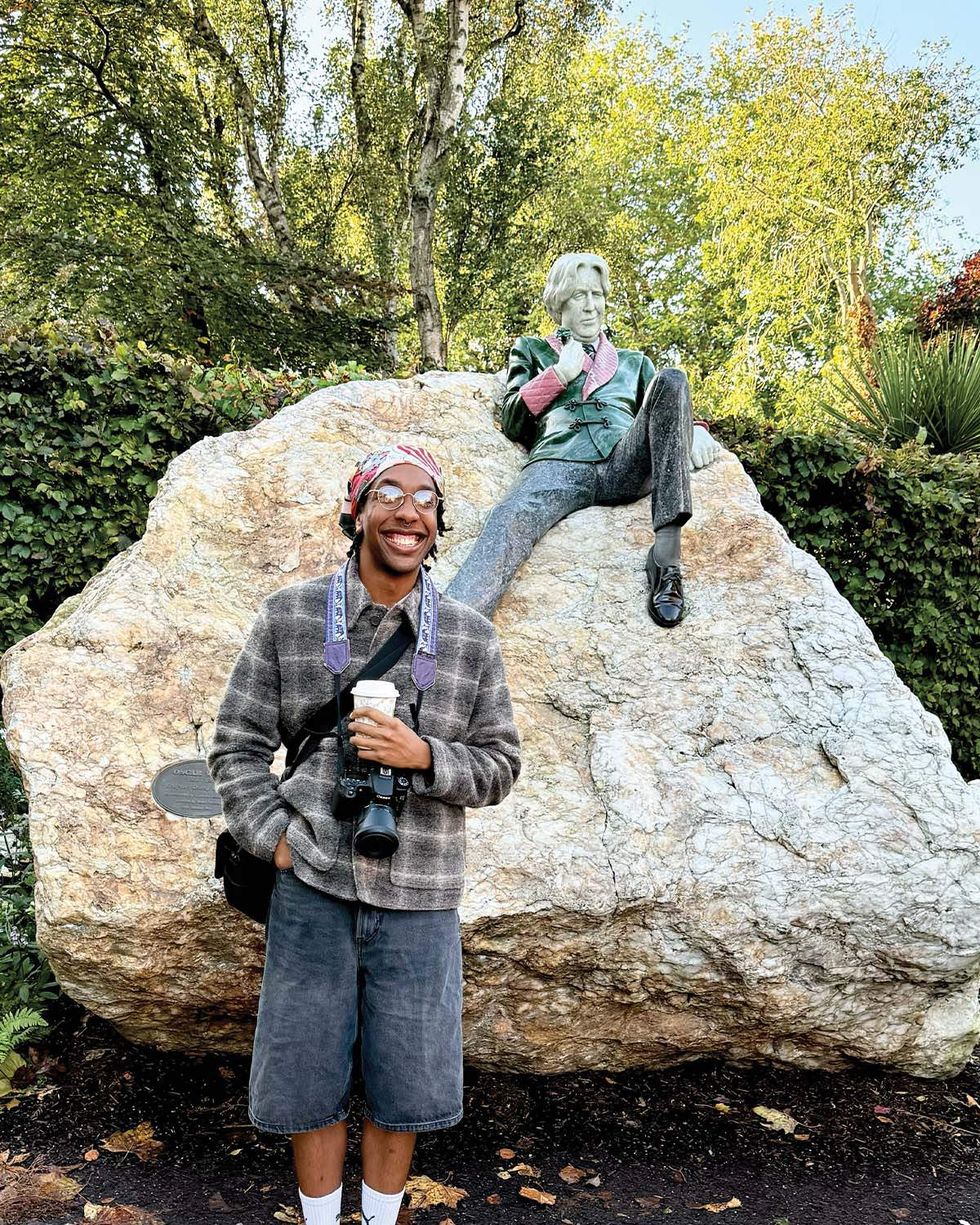 Taylor Henderson by the Oscar Wilde statue in Merrion Square Park