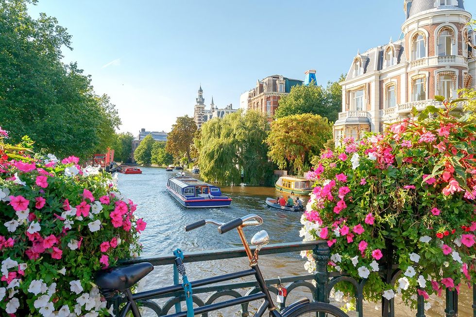 The top 10 queer-friendly cities in the world \u2013 No. 4. Amsterdam, The Netherlands (a picturesque canal in Amsterdam)