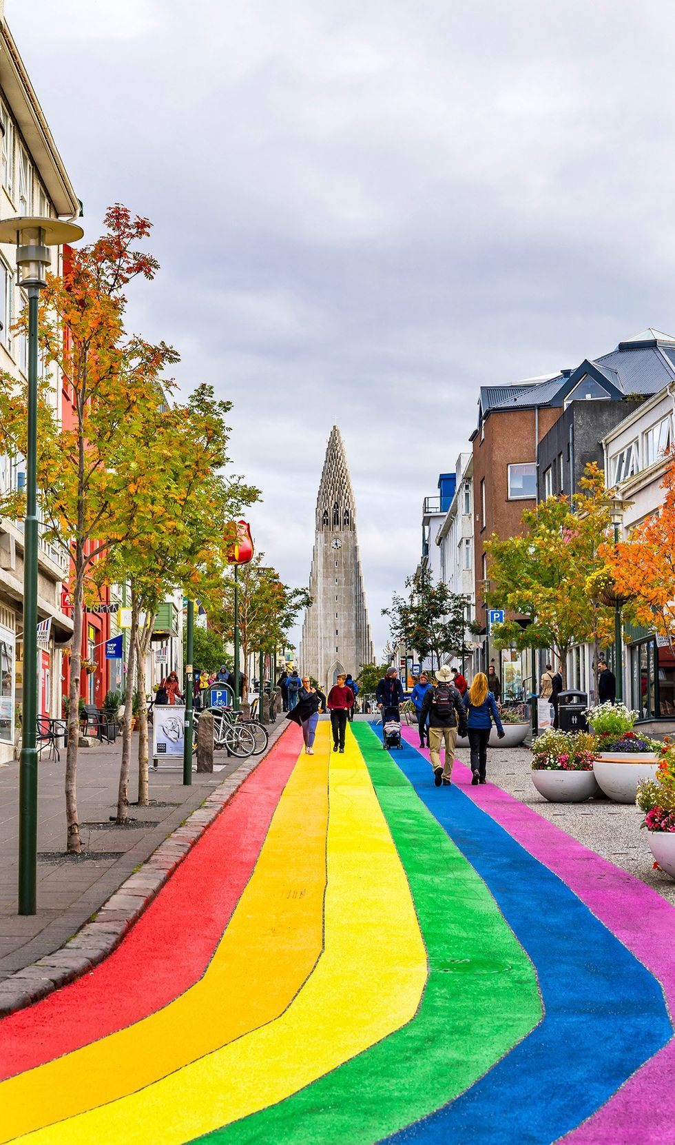 The top 10 queer-friendly cities in the world \u2013 No. 7. Reykjavik, Iceland (a rainbow path leads to Hallgrimskirkja Lutheran Church)
