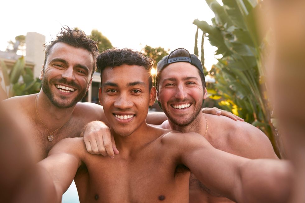Three gay friends taking a selfie