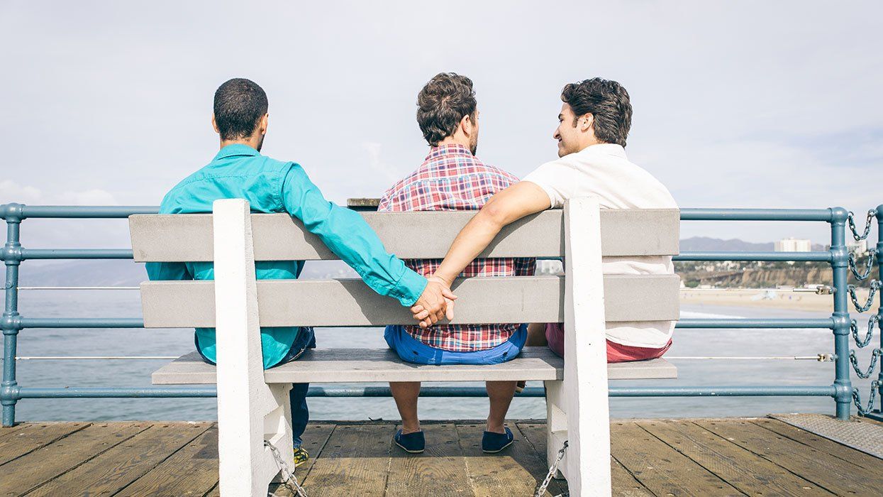 Three men bench holding hands