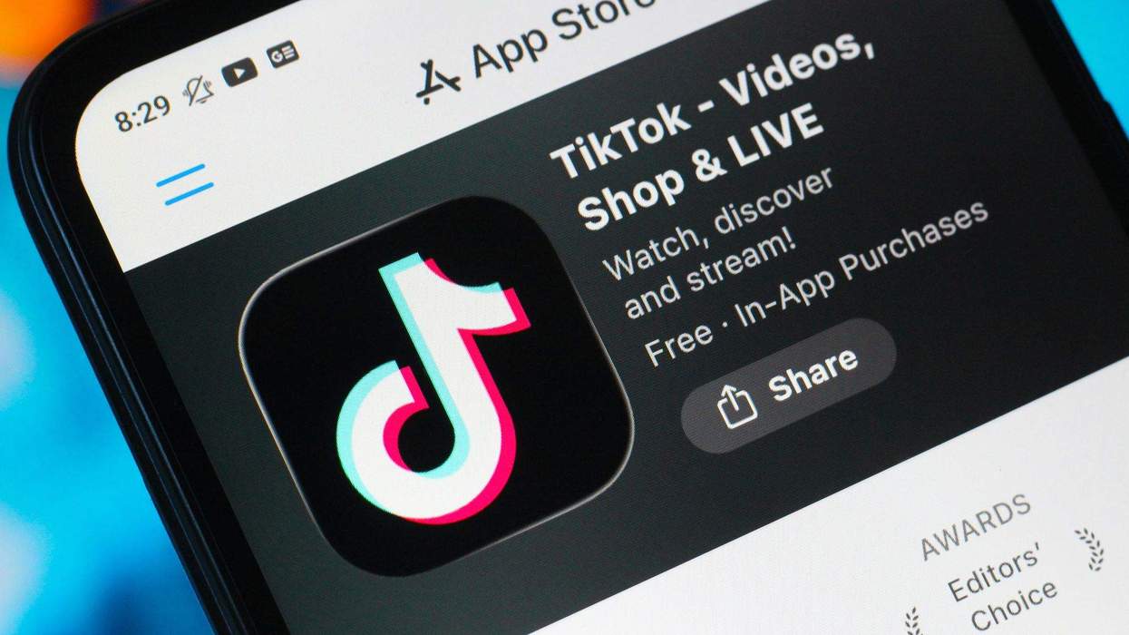 TikTok app displayed on App Store screen, showing details and the share button.