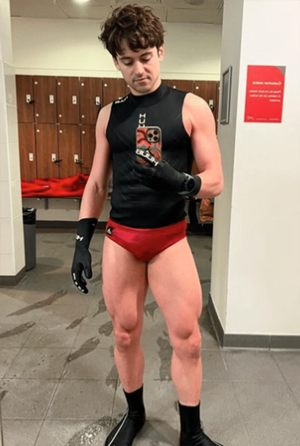 Tom Daley's legs and speedo are filling out nicely