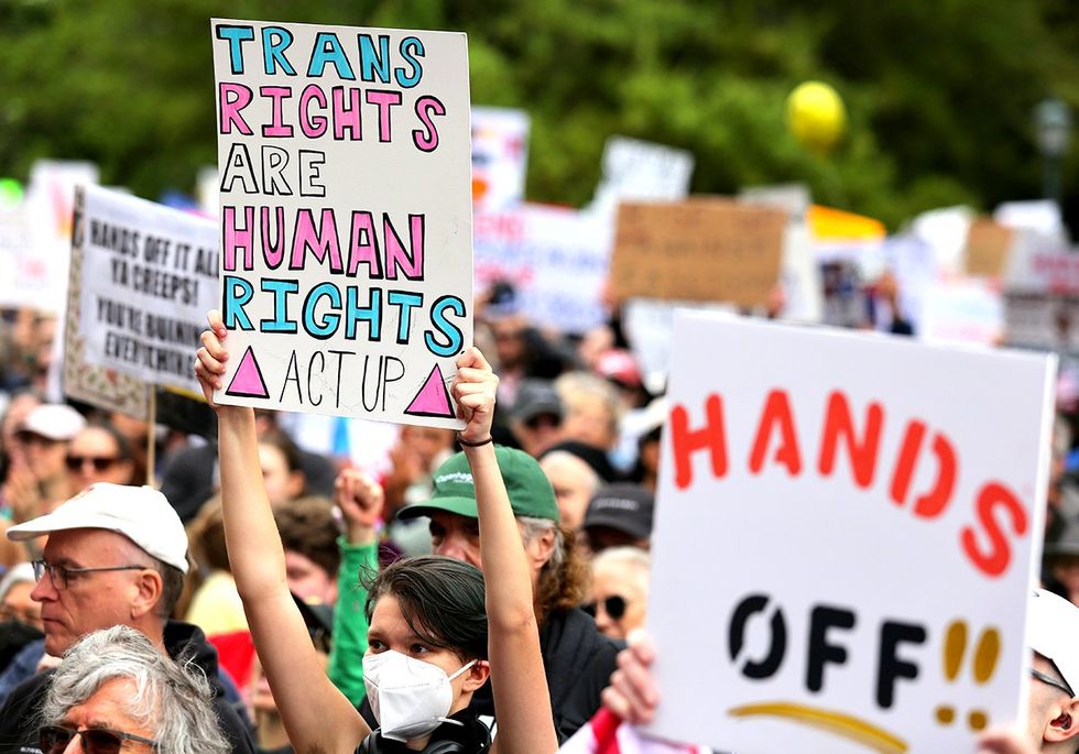 trans rights are human rights sign Hands Off rally at the state capitol Austin TX April 2025