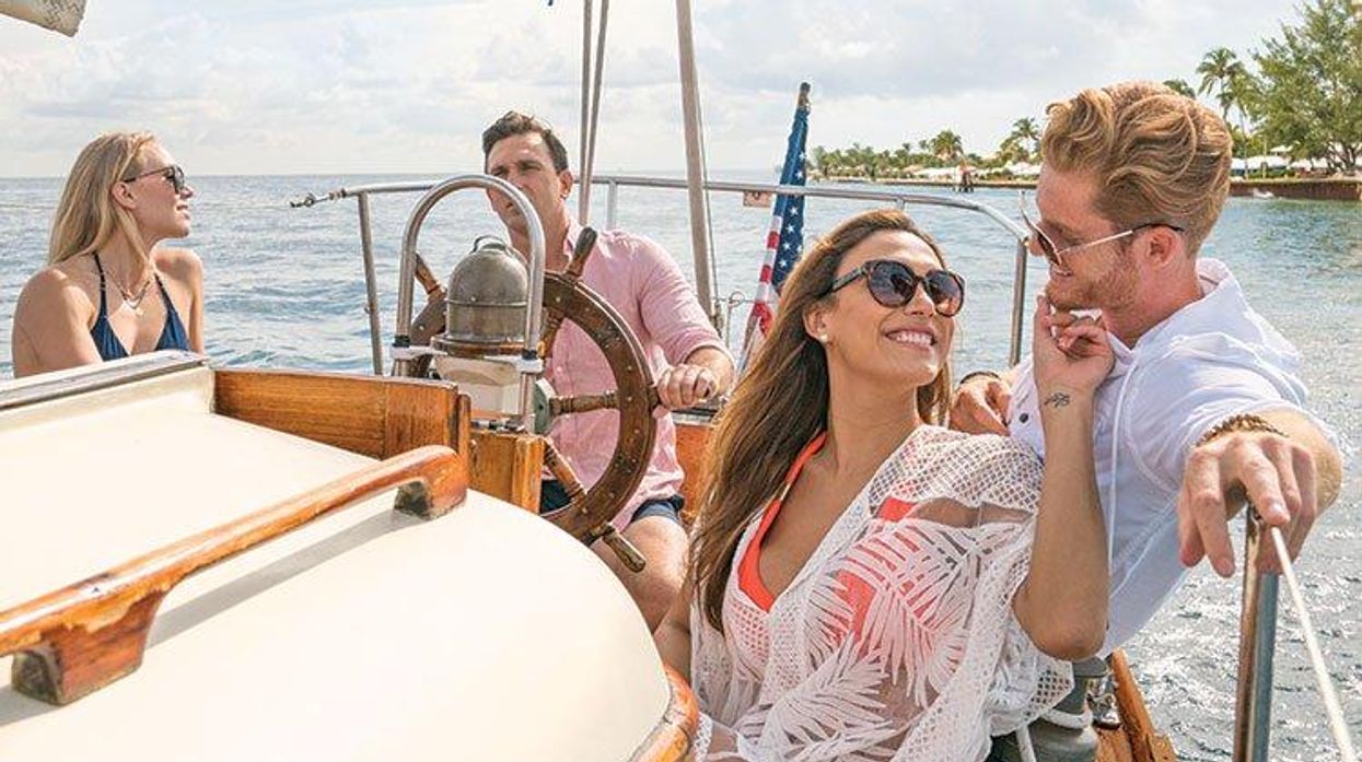 Trans travelers enjoy the sun aboard a sailboat in sunny Fort Lauderdale.