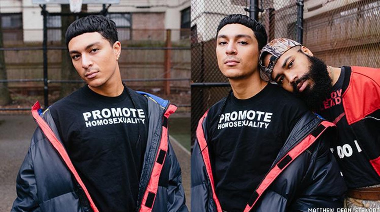 Two boys in "Promote Homosexuality" shirts by Willie Norris.