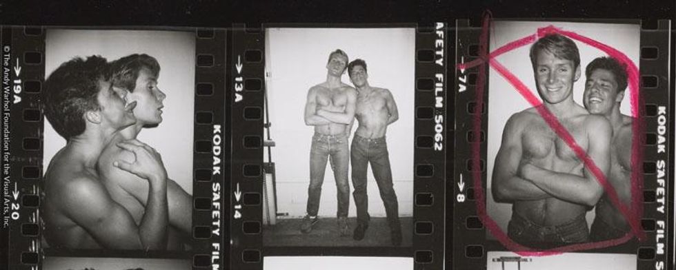 Two male models posing, used as the poster image for Rainer Werner Fassbinder’s film, 'Querelle', 1982.