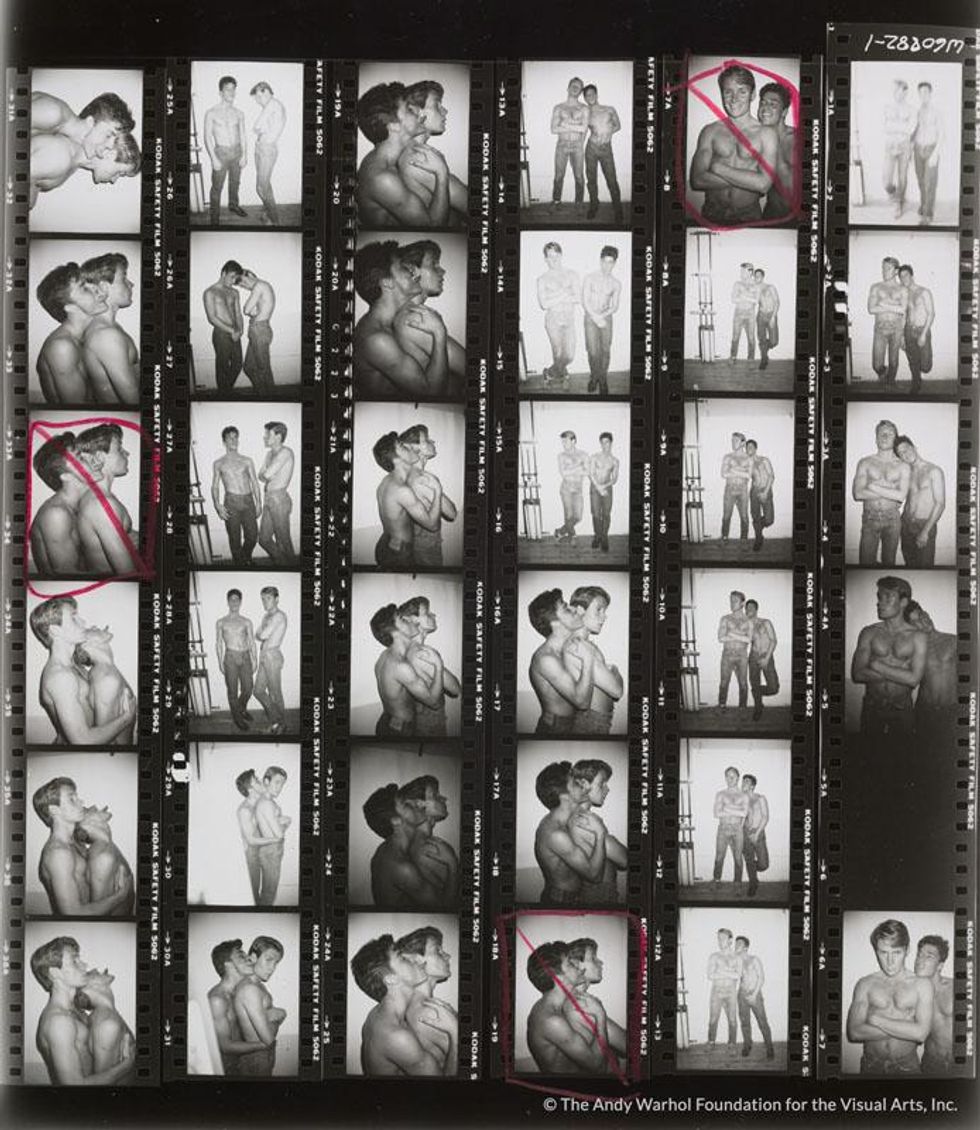 Two male models posing, used as the poster image for Rainer Werner Fassbinder’s film, 'Querelle', 1982.